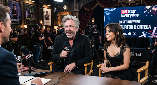 Actress in gothic tailoring beside a director on a Victorian house set